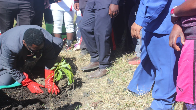 
Former Mbeya District Commissioner, Paul Ntinika plants a tree to mark the launch of economic and technical empowerment of women waste pickers project.

 