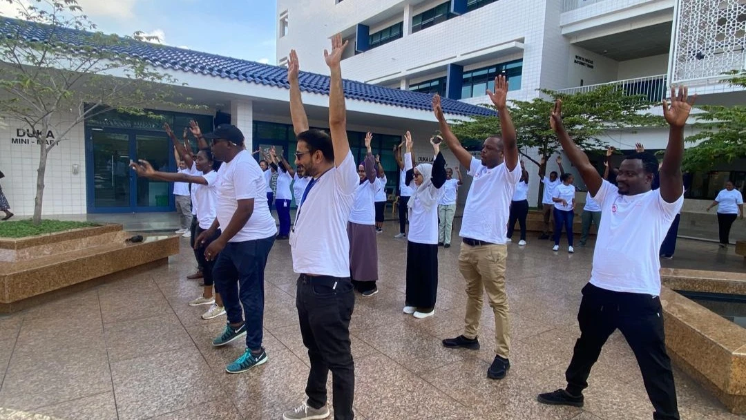 Aga Khan hospital Workers, in Dar es Salaam today, conducting aerobic exercise to commemorate the World Heart Day.