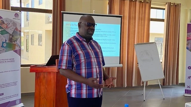 Associate Professor of Development Economics at the University of Dar es Salaam Prof Abel Kinyondo stresses a point on tax justice during a journalists training organized by Policy Forum in Dodoma. 