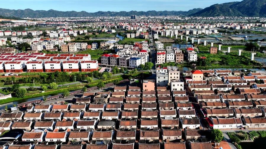 An aerial drone photo taken on July 10, 2024 shows a view of Daimei Village in Longhai District of Zhangzhou City, southeast China's Fujian Province. 