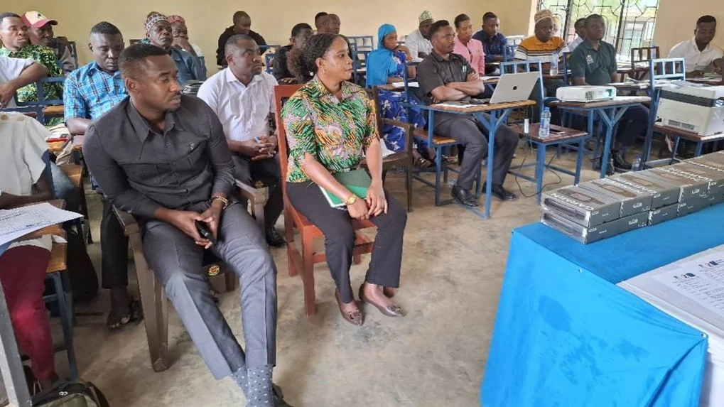 Stakeholders of the Integrated Forest Biomass Energy Solutions for Tanzania (IFBEST) from different villages and Handeni District staff listen to a briefing of the project from the IFBEST's Project Manager, Simon Lugazo (not in picture).