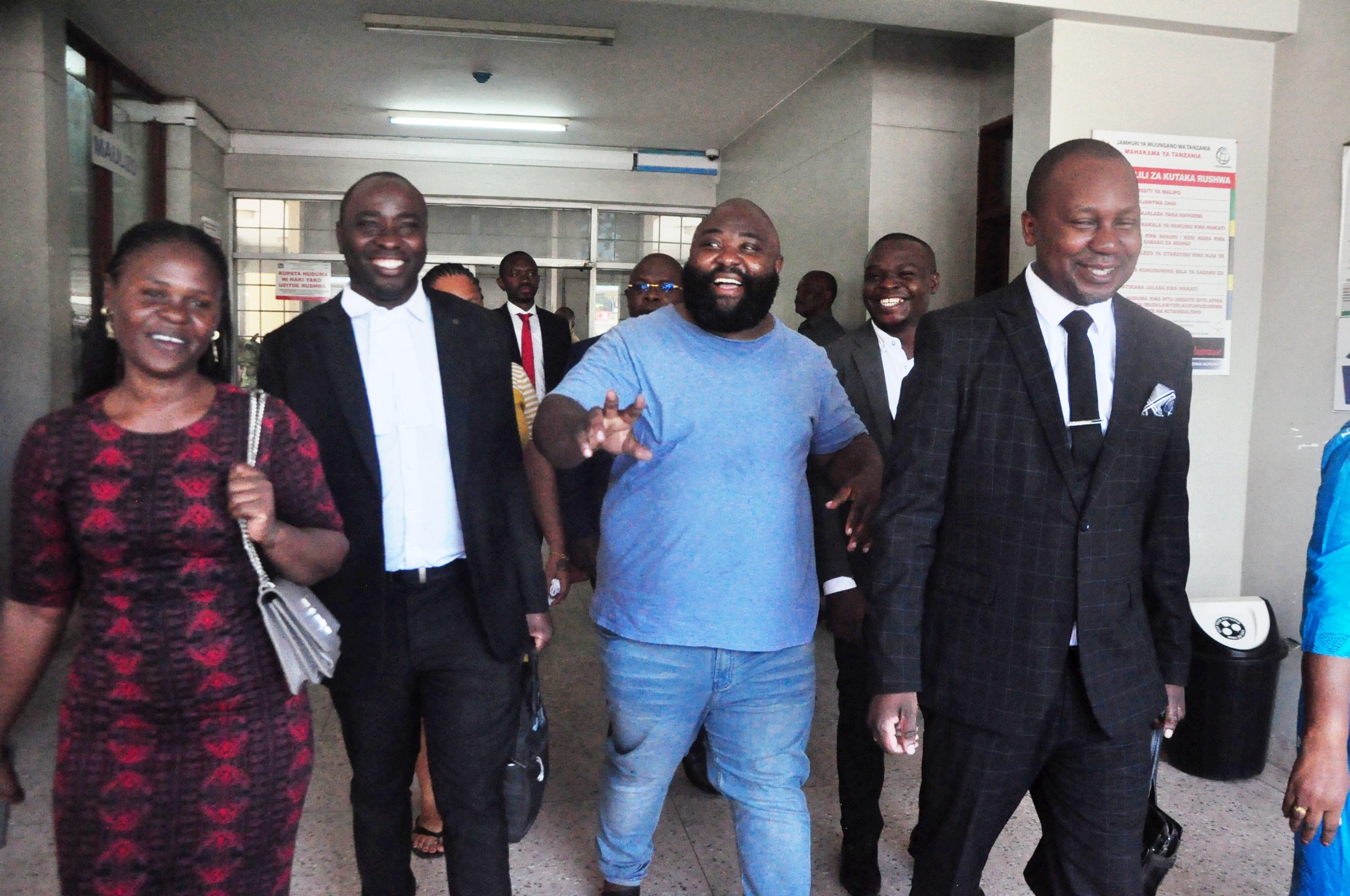 Embattled Boniface Jacob (gesturing), Coast Zone chairman of the opposition Chadema and a former municipal mayor, accompanied by his lawyers shortly after being granted bail at the Kisutu Resident Magistrate’s Court in Dar es Salaam yesterday. 