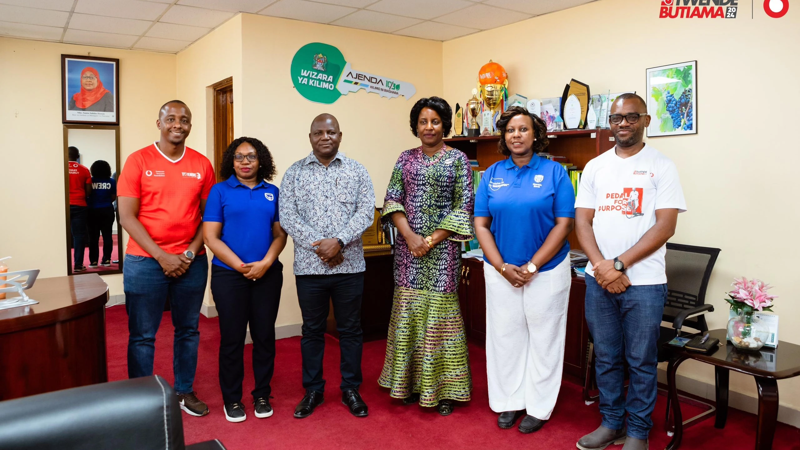 Vodacom Tanzania Plc and Stanbic Bank Tanzania officials paid a courtesy visit to Dodoma Regional Commissioner Ms. Rosemary Senyamule (centre) ahead of the arrival of the Twende Butiama Cycling Tour in Dodoma on Tuesday last week. 