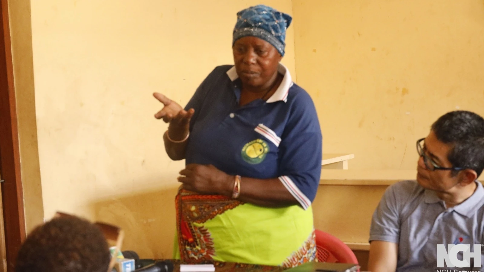 One of the Subira Group members in Mnenia village, Kondoa District briefs a team of journalists, representatives from the Japanese Embassy in Tanzania and the Japan International Cooperation Agency (JICA)