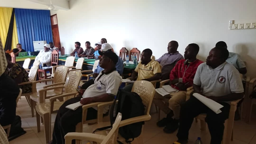 Experts and officials from Pangani District listen to presentation on implementation of the Integrated Forest Biomass Energy Solutions for Tanzania (IFBEST) project.