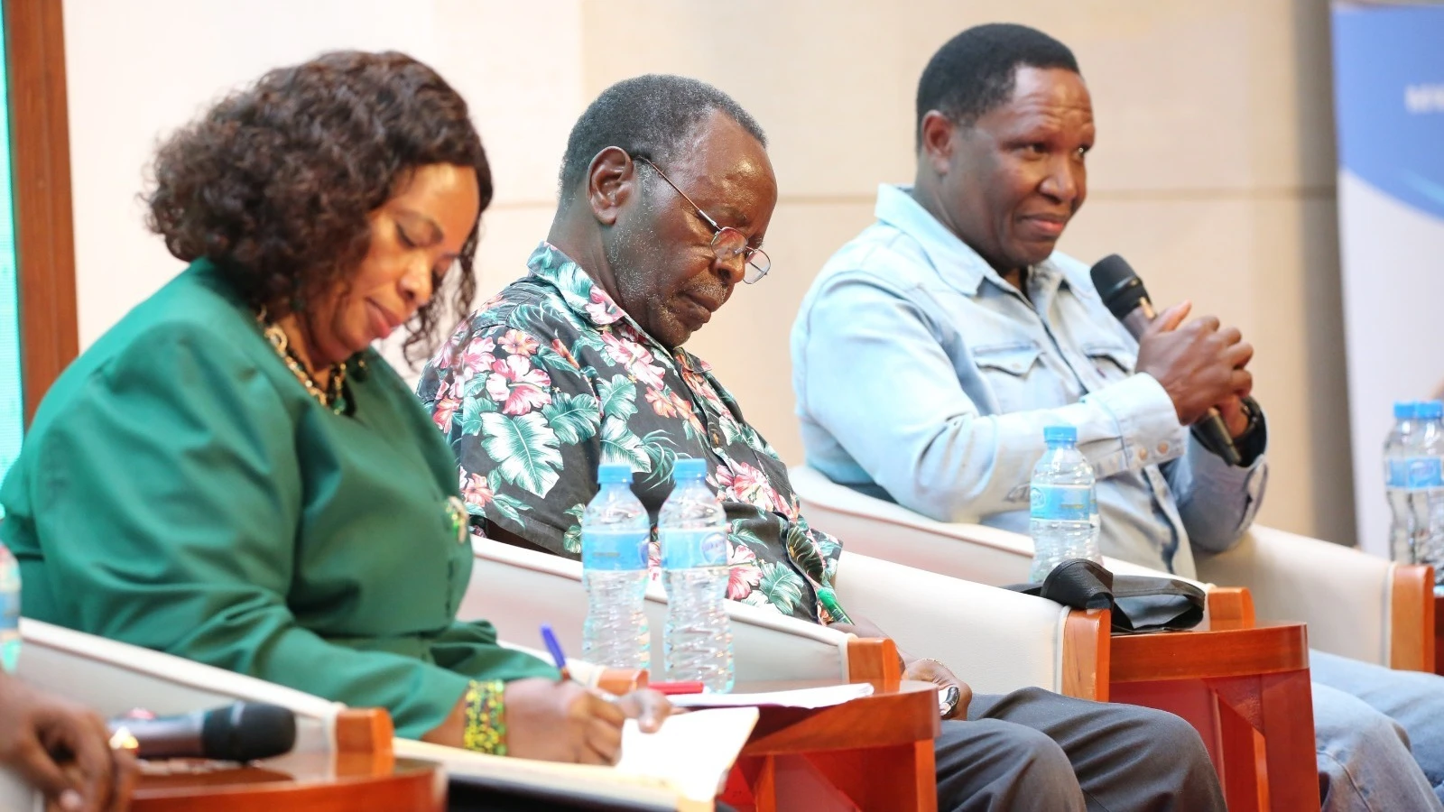 Former PLAN combatant, Dr Charles Mubita (right), speaks at a past event at Mwalimu Julius Nyerere Leadership School (MJNLS) in Kibaha District, Coast Region. Others are Prof Marcelina Chijoriga, Principal at MJNLS (L) 