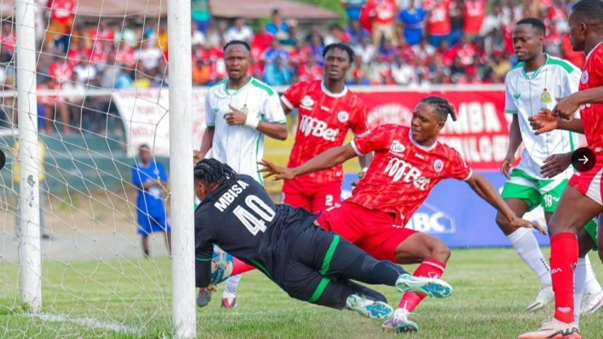 
Simba defender Che Malone Fondoh (C) scores his side’s winning goal against Tanzania Prisons in their Premier League match held at Sokoine Stadium in Mbeya on Tuesday. Simba won 1-0. 