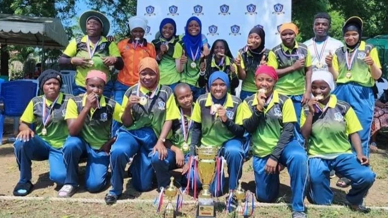 Cricketers making the Tanga Queens team pose with silverware following the completion of the 2024 TCA National Women's Championship in Dar es Salaam recently. Tanga Queens overcame Morogoro Queens in the final.