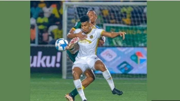 Yanga captain and defender, Bakari Mwamnyeto, marking Azam FC striker Nassor Saadun to protect his goal during a Tanzanian Premier League match at Azam Complex Stadium, Chamazi, Dar es Salaam.