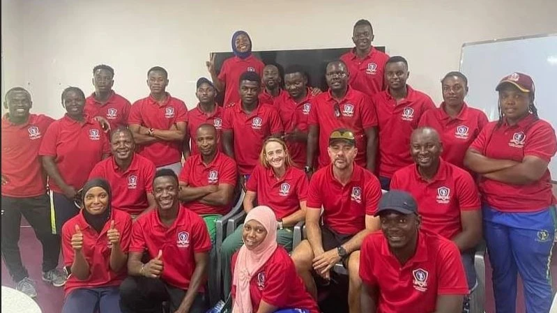 Tanzania's cricket coaches, who went for the 'Coach the Coaches' course, in a group picture with the course's instructors from South Africa, after the training's conclusion in Dar es Salaam recently. 