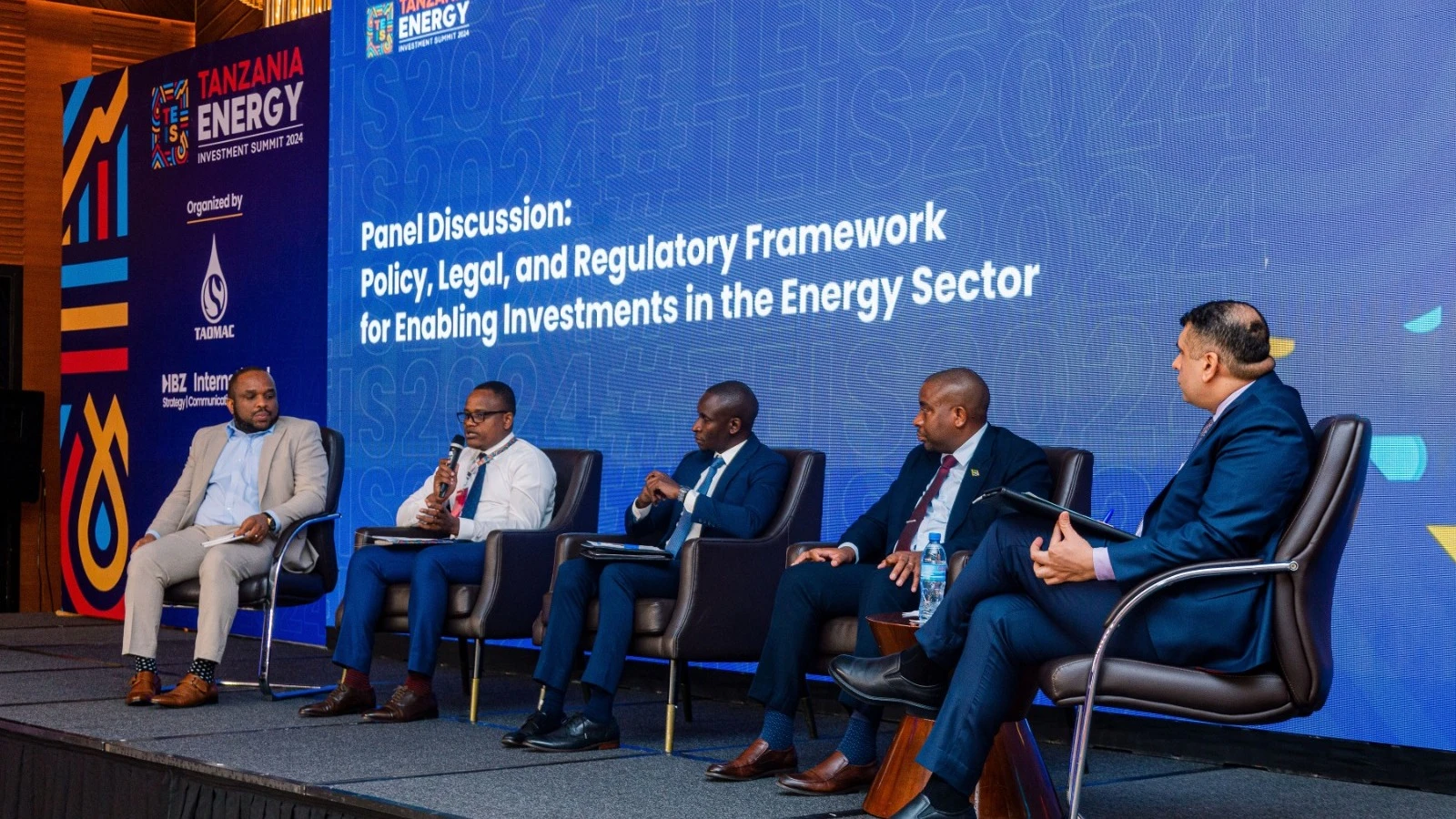 
Discussants listen to Kennedy Rwehumbiza, head of research and policy, TPSF (2nd L) during the Tanzania energy investment summit held on Tuesday in Dar es Salaam. 
 