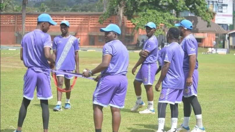 Tanzania's senior men's cricket team players warm up before facing Singapore in an ICC Men's Cricket World Cup Challenge League B clash in Kampala on Wednesday.