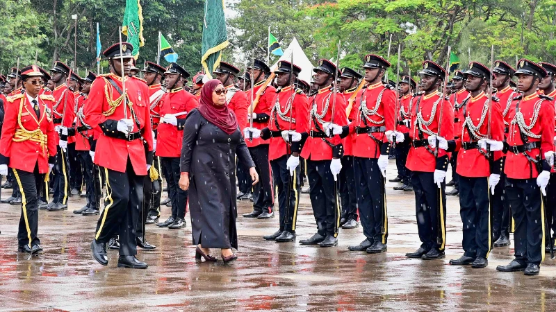 Commander-in-Chief President Samia Suluhu Hassan inspects an honour guard shortly before commissioning 236 Tanzania People’s Defence Forces officer cadets at the Tanzania Military Academy in Monduli District, Arusha Region, yesterday. 