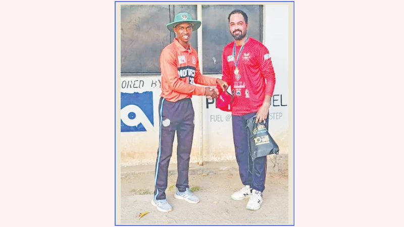 Lions A cricket side's Kashif Ahmad (R) gets the Player of the Match prize upon the conclusion of the squad's 2024 Tanzania Cricket Association (TCA) Delaware Champions League tie versus Aga Khan SC in Dar es Salaam recently. 