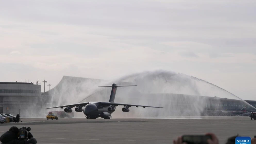 A military aircraft carrying the remains of Chinese People's Volunteers (CPV) martyrs is honored with a water salute after landing at the Taoxian international airport in Shenyang, northeast China's Liaoning Province, Nov. 28, 2024. 