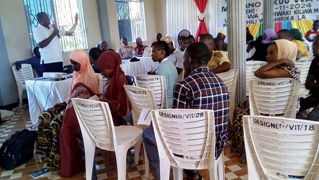 Jacob Kateri, a facilitator from Education and Research on Democracy in Africa (standing) speaks to KIYODI’s members about three-years strategic plan at Tumaini Jipya kwa Wanawake Kilwa (TUJIWAKI) building. 