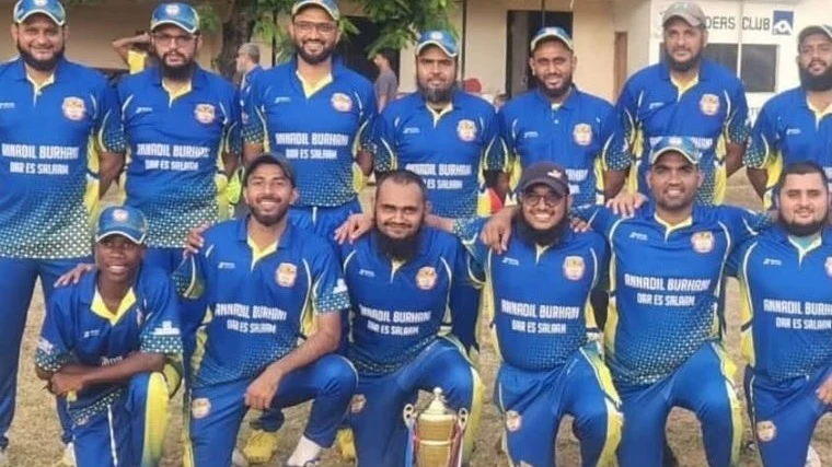 Cricketers making Annadil Burhani Cricket Club pose with a trophy after the conclusion of the 2024 Tanzania Cricket Association (TCA) Dar T20 Cup Division B1 showdown in Dar es Salaam recently. The outfit overcame Unisoft Rising Stars in the final. 