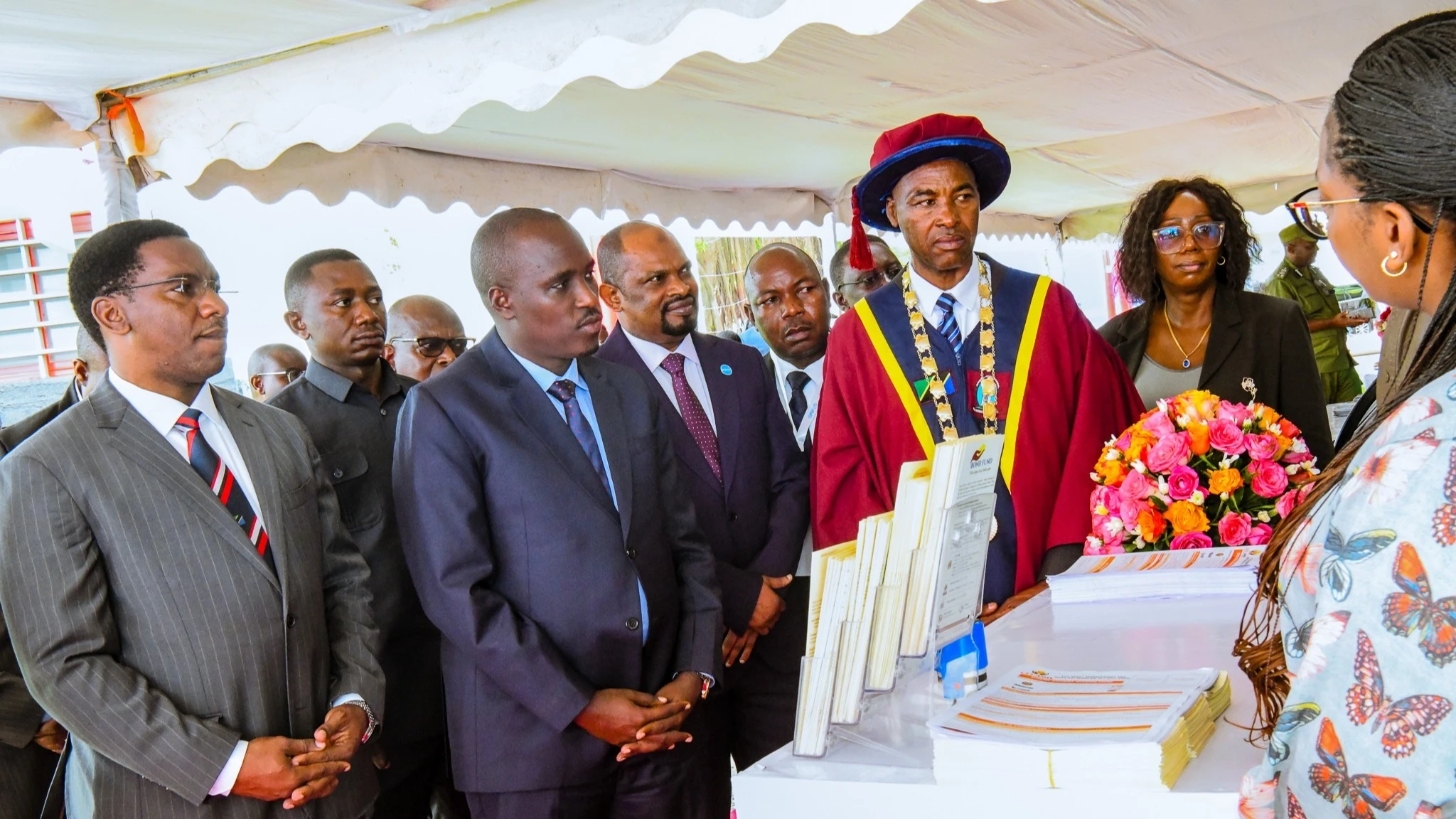 Deputy Prime Minister and Energy minister Dr Doto Biteko (2nd-L, foreground) visits a pavilion at an exhibition held in Arusha city on Tuesday in tandem with the 15th Conference of Procurement and Supply Professionals which he opened shortly later. 