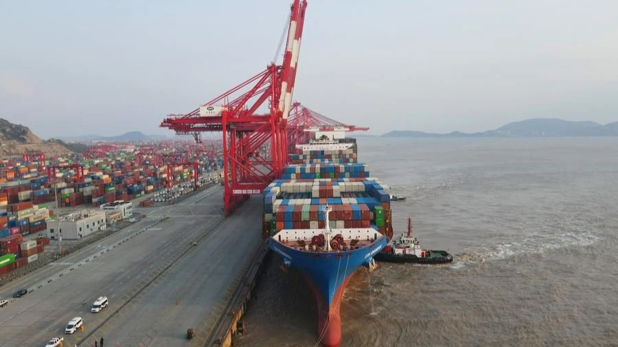 An aerial drone photo shows the "Xin Shanghai," a vessel operated by China COSCO Shipping Corporation Limited, berthed at Yangshan Port, east China's Shanghai, Dec. 18, 2024.