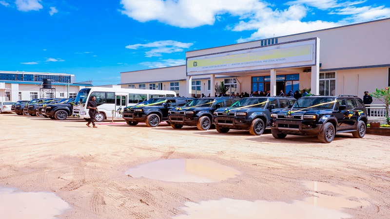 Nine vehicles issued recently by the government to the Mama Samia Legal Aid Campaign parked at the Constitution and Legal Affairs ministry buildings in Dodoma city yesterday. 