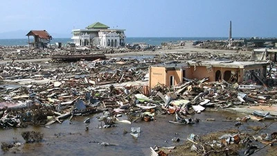 Tsunami aftermath in Banda Aceh, Indonesia, where only a few structures remained standing. The 20th anniversary will be observed on December 26, this year. 