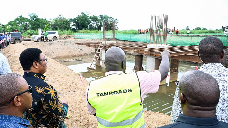 Prime Minister Kassim Majaliwa pictured yesterday while on an inspection tour of progress in the reconstruction of Simiyu Bridge, a strategic link for Mwanza, Simiyu and Mara regions. The work is expected to cost 48.7 billion/-.