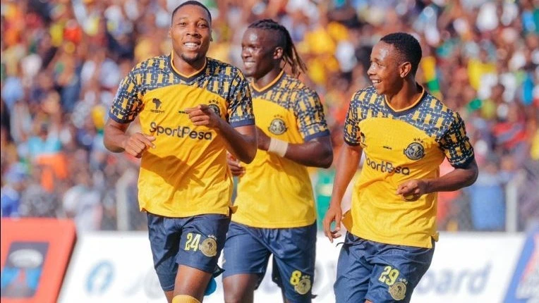 Young Africans winger Clement Mzize celebrates his side’s third goal with teammates Khalid Aucho and Prince Dube during their Premier League match against Dodoma Jiji at Jamhuri Stadium in Dodoma yesterday. 