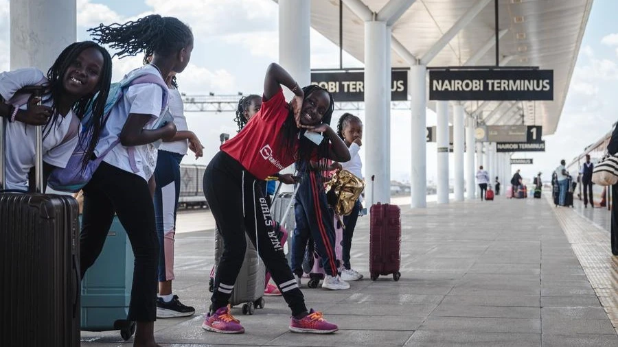 Children wait to board a train at the Nairobi Station of the Mombasa-Nairobi Railway in Nairobi, Kenya, Oct. 6, 2023.