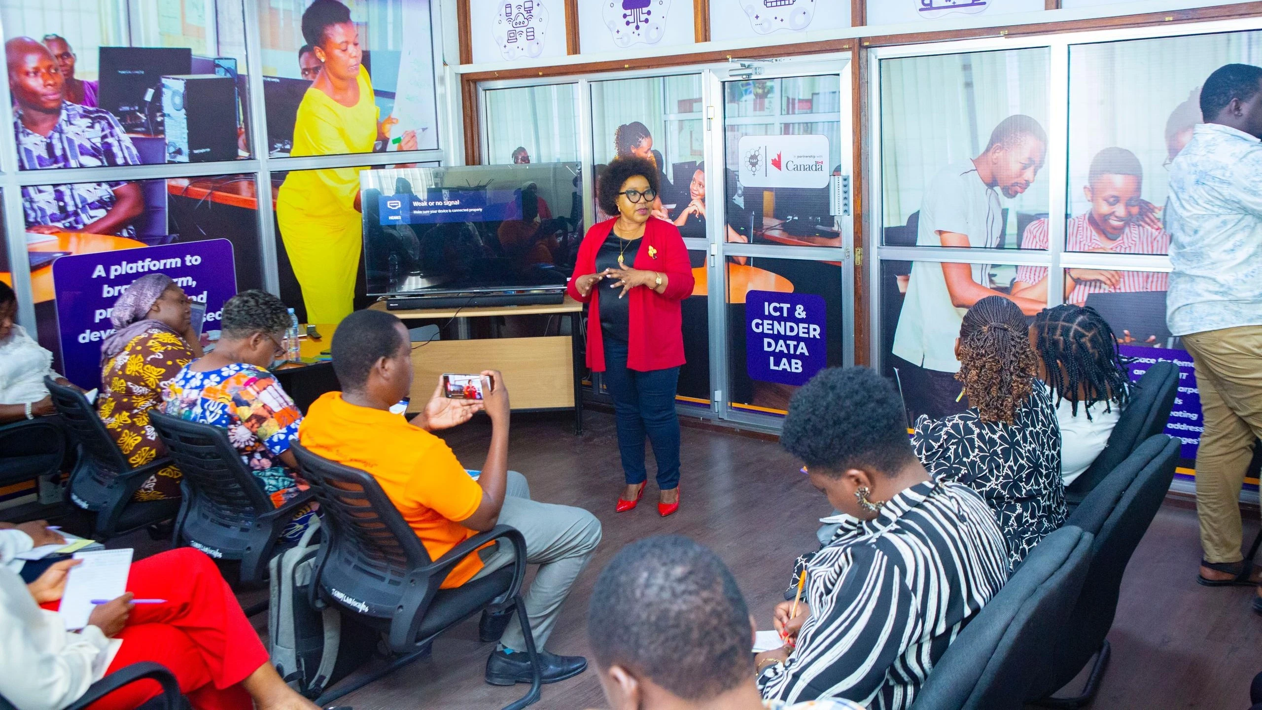 Lilian Liundi, Tanzania Gender Networking Programme (TGNP) Executive Director (standing) addresses journalists on this year’s celebration of three decades since the adoption of the Beijing Declaration and Platform for Action