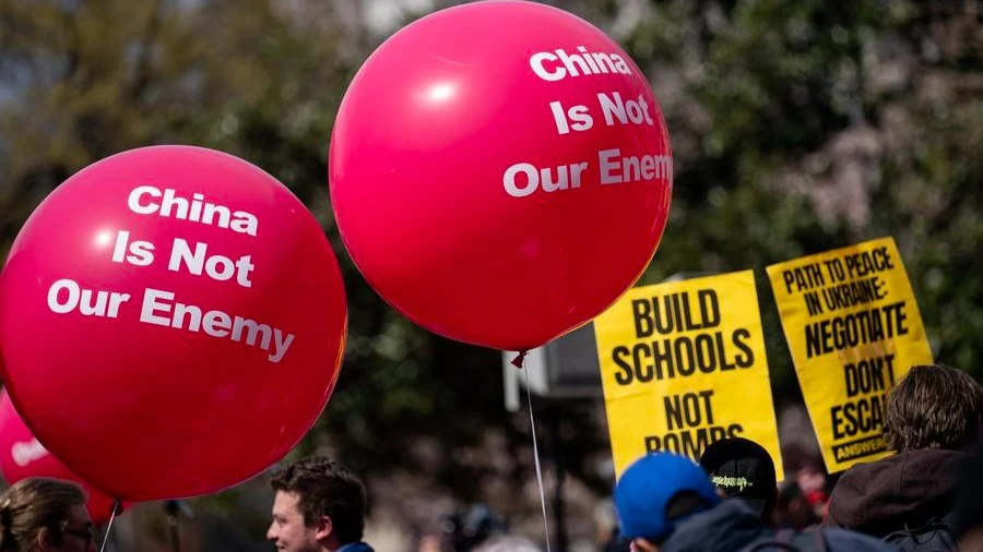 Protesters gather during the anti-war demonstration in Washington, D.C., the United States, March 18, 2023. 