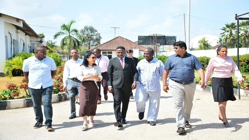 The Guardian Newspaper Managing Editor Wallace Mauggo (3rd-R) and Jackson Paulo,(4th-R) TGL’s Deputy General Manager , takes around the Chinese ambassador to Tanzania, Chen Mingjian Ambassador to the media house printing area during a courtesy visit .