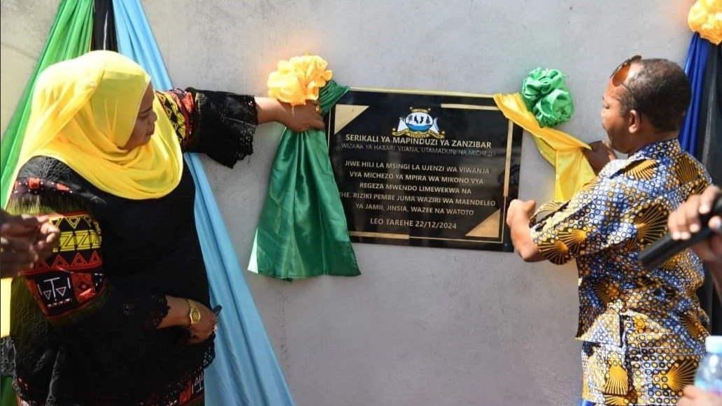 
 The Minister for Community Development, Gender, Elderly, and Children of the Revolutionary Government of Zanzibar, Riziki Pembe Juma (L), lays the foundation stone for the construction of elite sports venues in Zanzibar. 