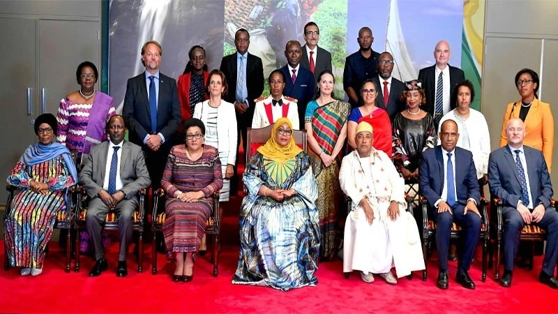 President Samia Suluhu Hassan in a group photo with various leaders and envoys representing their countries in Tanzania during the 2023 Diplomatic Sherry Party held at the State House in Dar es Salaam.

 