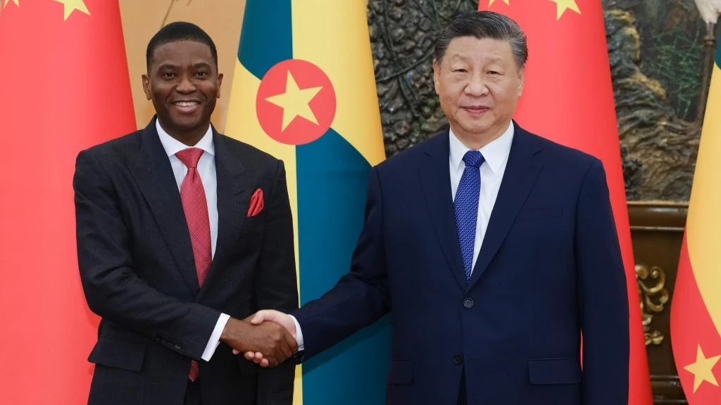 Chinese President Xi Jinping meets with Prime Minister of Grenada Dickon Mitchell, who is on an official visit to China, at the Great Hall of the People in Beijing, capital of China, Jan. 13, 2025.