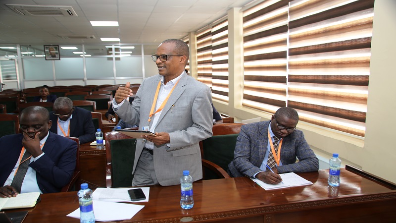 Victor Seif, the Tanzania Rural and Urban Roads Agency (TARURA) chief executive officer, explaining an issue to members of the Regional Administration and Local Governments standing committee of the National Assembly in Dodoma yesterday. 