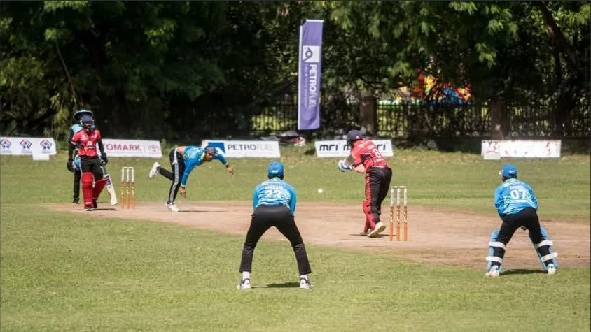 Delaware Upanga SC-A's Ramesh Alluri (2nd L) bowls against Lions Cricket Club in a past tournament clash in Dar es Salaam. 