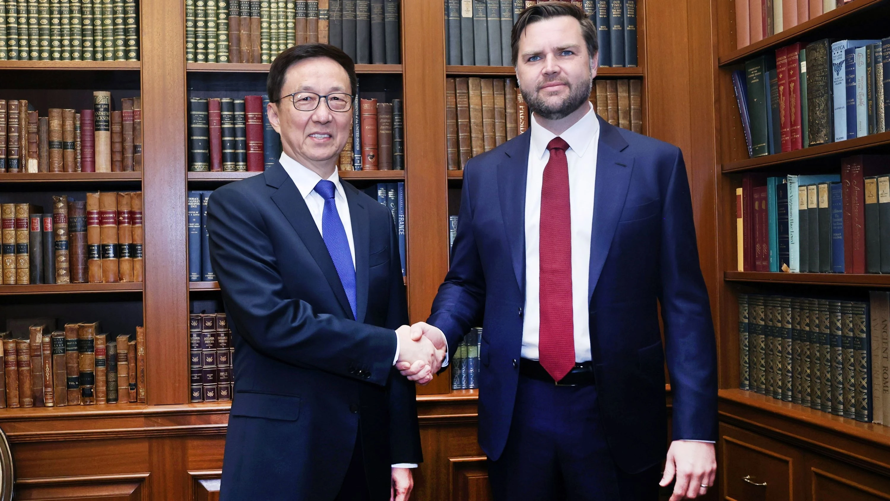 Chinese Vice-President Han Zheng (left) shakes hands with US Vice-President-elect JD Vance, in Washington, Jan 19, 2025. 