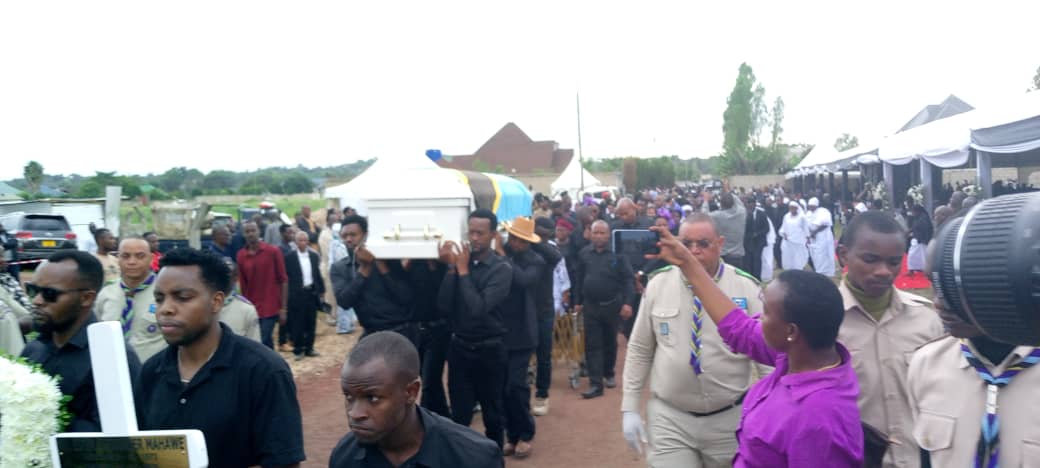 Casket bearing the body of the late Ester Mahawe, former Mbozi District Commissioner, arrive for burial ceremony at Matevesi area in Arusha City yesterday. 