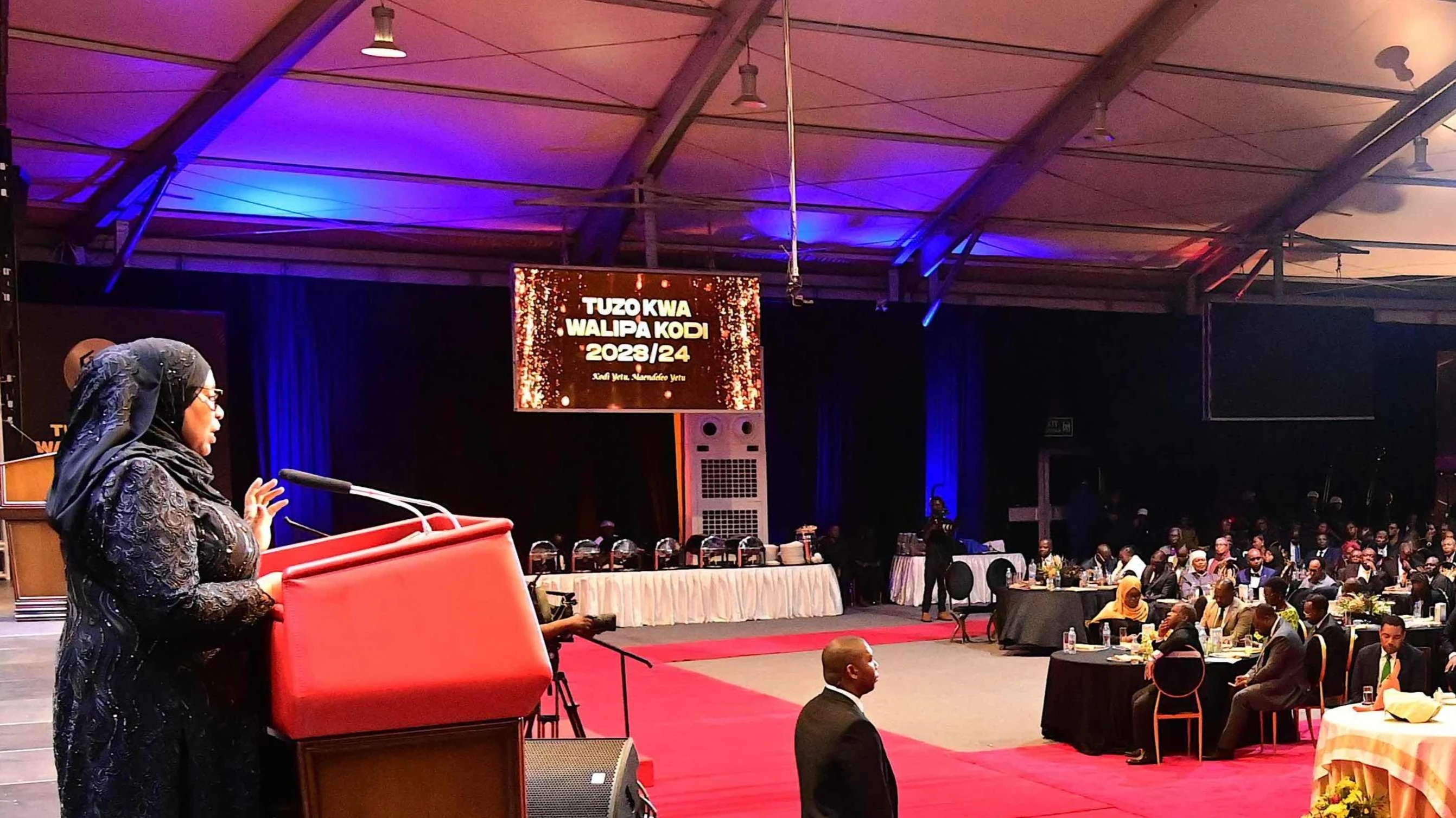 President Samia Suluhu Hassan addresses participants at the 2023/24 Best Taxpayer Awards ceremony in Dar es Salaam on Thursday evening