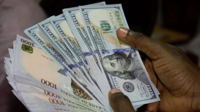 On January 22, the naira closed at N1,553 per dollar compared to N1,551.9 at the Nigerian Foreign Exchange Market (NFEM).