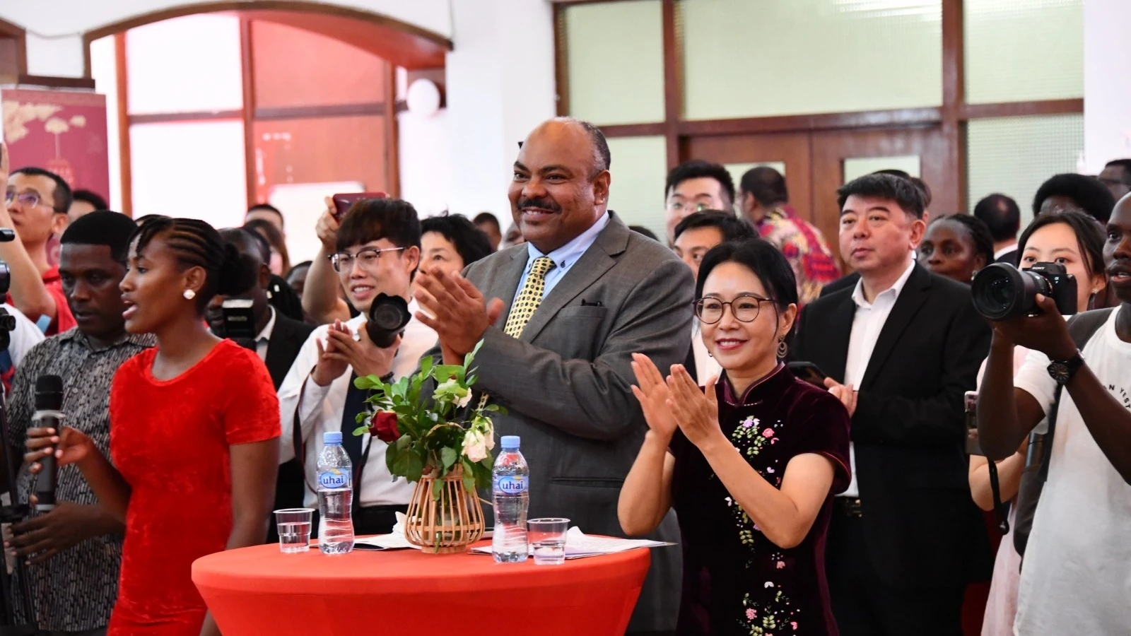 Chen Mingjian, the Chinese ambassador to Tanzania (5 th-Left) (in a black dress) cheering during the Chinese New Year reception held in Dar es Salaam over the weekend. (4th -Left) is the Foreign Affairs and East African Cooperation minister Mahmoud Thabit