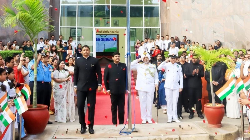 High Commissioner of India, Shri Bishwadip Dey (C) standing with other offi-cials to celebrate the India’s 76th Republic Day at the High Commission office in Dar es Salaam yesterday.