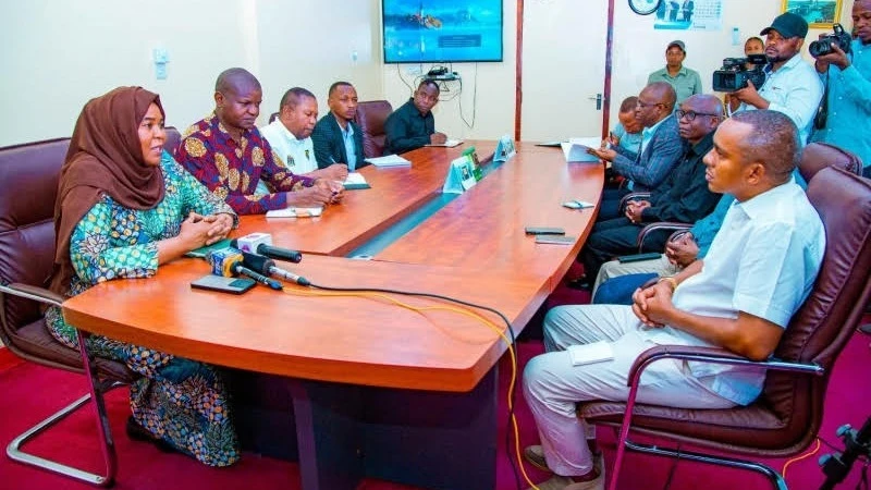  Communications and Information Technology Minister Jerry Slaa (R) briefs Tanga Regional Commissioner Ambassador Dr. Batilda Burian(L)  on ICT development in the country at her office in Tanga City during a one-day visit to the region over the weekend. 