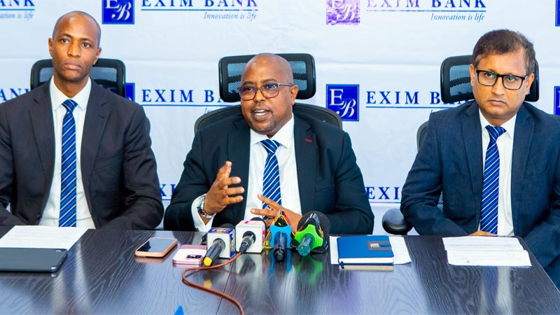 Exim Bank CEO, Jaffari Matundu (C), briefs journalists announces the official acquisition of Canara Bank Tanzania in Dar es Salaam on Wednesday, making it part of Exim Bank Tanzania. 