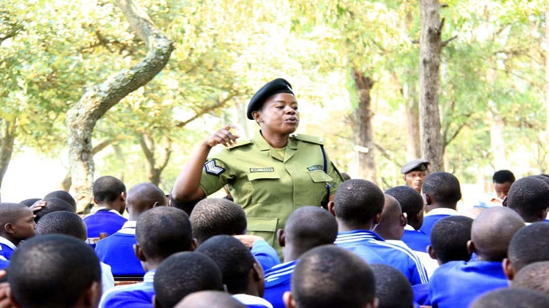 Sergeant Sijali Nyambuche, head of the gender desk for Serengeti District police station  in Mara Region provides education on the dangers of gender-based violence to pupils of Kisangura Secondary School in Mugumu earlier this week