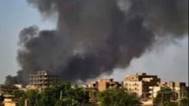 
Smoke rises above buildings in Khartoum amid the war in Sudan