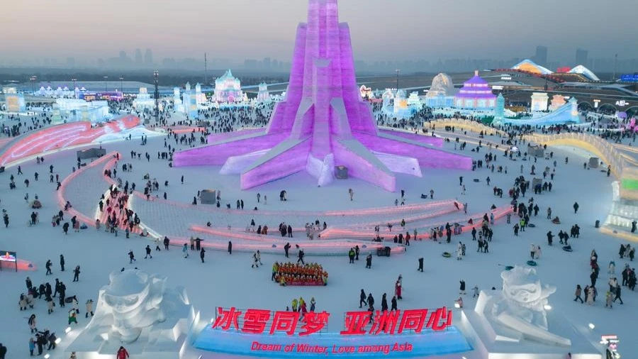 An aerial drone photo shows tourists visiting the Harbin Ice-Snow World in Harbin, northeast China's Heilongjiang Province, Jan. 23, 2025. 