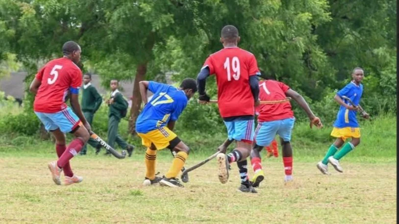 Hockey players are in action during one of the 2024 Mapinduzi hockey tournament clashes at Ukonga venue in Dar es Salaam in March