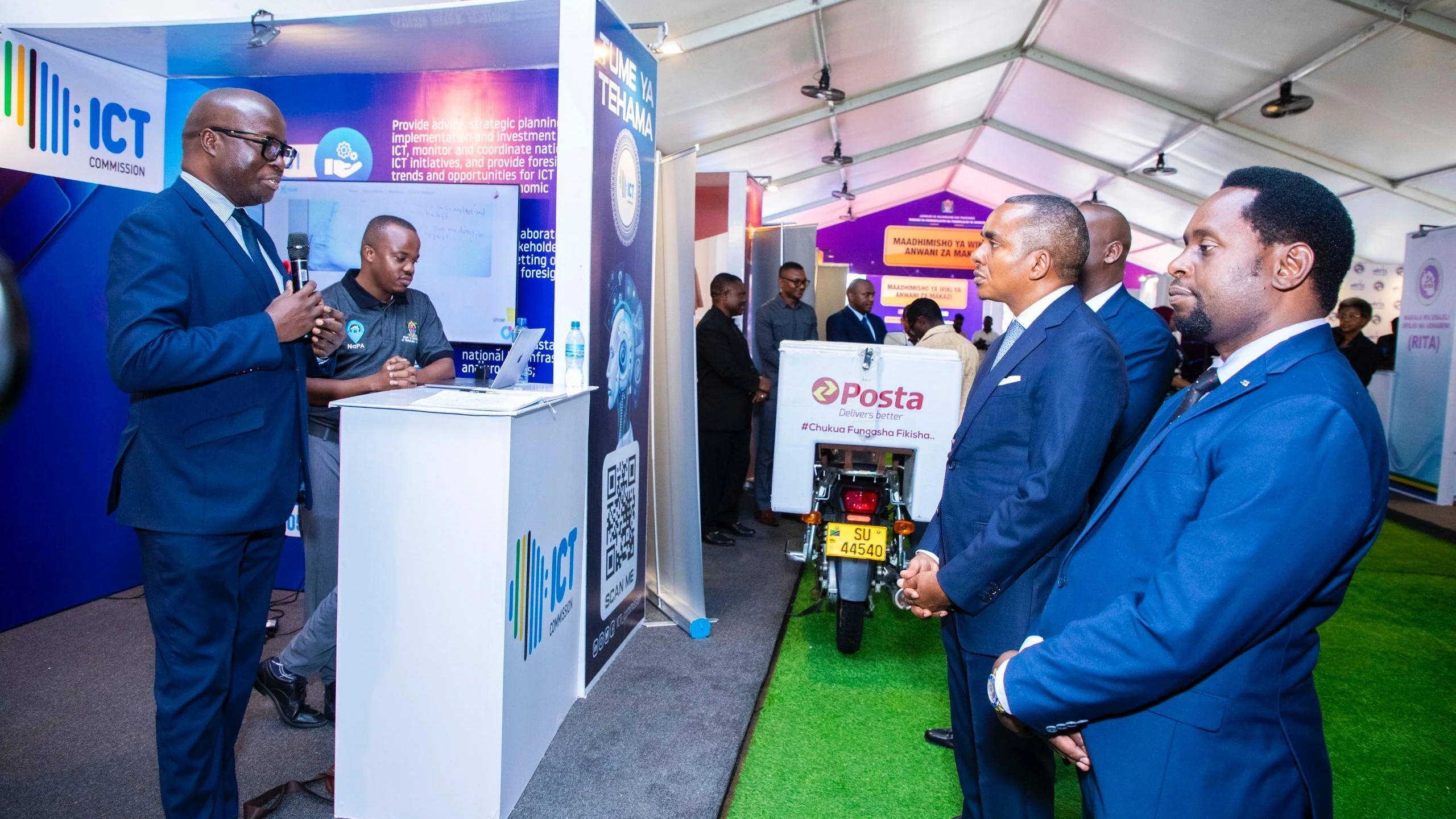 ICT Commission Director General Dr. Nkundwe Mwasaga clarifies a point to the Minister of Communications, Technology and Information, Jerry Silaa yesterday at the residential address campaign launch in Dodoma.