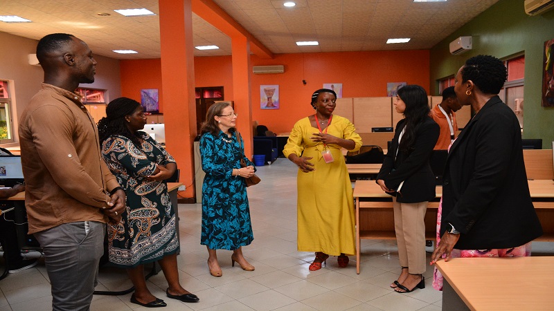 EATV/Radio product development manager Lydia Igarabuza (gesturing) briefs the high commissioner on operations at the twin-stations.